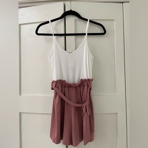 Francesca’s Casual Romper. White and mauve pink. Size M, NWT.